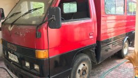 Red Isuzu Elf for sale in Manila