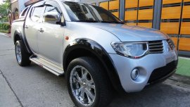 Pearl White Mitsubishi Strada 2010 for sale in Pasig