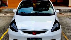 Pearl White Honda Jazz for sale in Quezon 