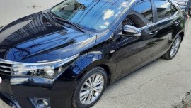 Sell Black 2014 Toyota Corolla in Bauan