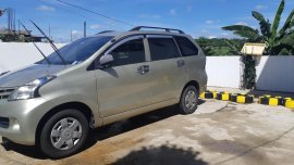 Selling Gold Toyota Avanza 2013 Van in Cavite City