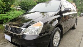 Black Kia Carnival 2012 for sale in Pasig