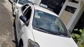 Selling White Toyota Vios in Quezon City