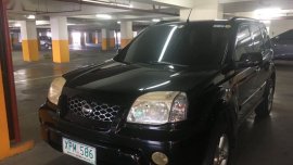 Selling Black Nissan X-Trail in Quezon City
