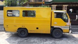 Sell Yellow Isuzu Elf in Parañaque