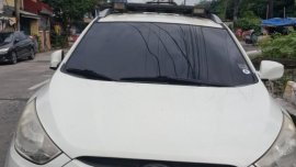 Pearl White Hyundai Tucson 2010 for sale in Manila