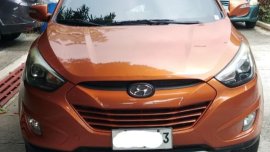 Sell Orange Hyundai Tucson in Manila