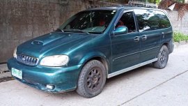 Blue Kia Carnival for sale in Las Piñas