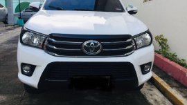 White Toyota Hilux for sale in Caloocan