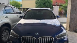 Selling Blue Bmw X1 in Parañaque