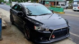 Black Mitsubishi Lancer 2013 for sale in Silang