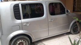Sell Pearl White 2011 Nissan Cube in Consolacion