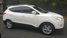 Selling White Hyundai Tucson 2013 SUV at 33051 km in Manila