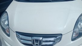 White Honda Brio Amaze 2016 for sale in Quezon City