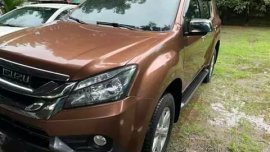 Isuzu MU-X 2015 ( outback brown )