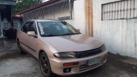 Selling Brown Mazda 323 1997 in San Pedro