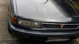 Black Mitsubishi Lancer 2004 for sale in Calamba