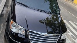 Selling Black Chrysler Town And Country 2010 in Pasig