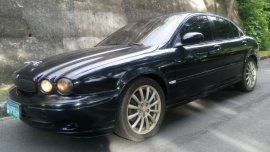 Selling Black Jaguar X-Type 2004 in Cebu