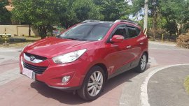 Selling Red Hyundai Tucson 2012 in Pasig