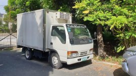 Pearl White Isuzu Elf 1999 for sale in Makati