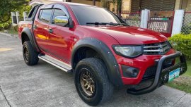 Selling Red Mitsubishi Strada 2013 in Cebu City