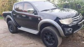 Sell Black 2011 Mitsubishi Strada in Los Baños