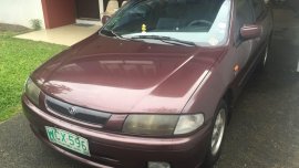 Selling Purple Mazda Familia 1998 in Quezon