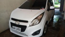 Pearl White Chevrolet Spark 2014 for sale in Manila