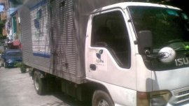 White Isuzu Elf 2004 for sale in Manila