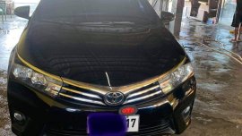 Selling Black Toyota Corolla Altis 2014 in Gapan