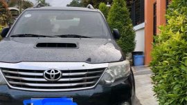 Selling Black Toyota Fortuner 2014 in Davao