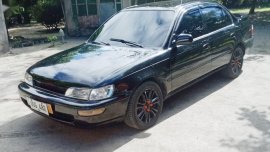 Selling Black Toyota Corolla 1997 in Floridablanca