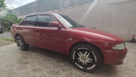 Red Mitsubishi Lancer 2004 for sale in Taytay