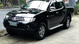 Black Mitsubishi Strada 2012 for sale in Quezon
