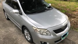 Brightsilver Toyota Corolla Altis 2010 for sale in Quezon