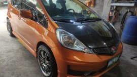 Selling Orange Honda Jazz 2012 in Valenzuela