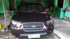 Used but not abused SUPERIOR RED Hyundai Sta Fe 2009 for sale
