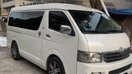 Pearl White Toyota Hiace Super Grandia 