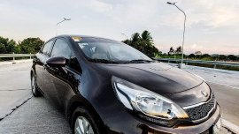 Selling Black Kia Rio 2015 in Imus