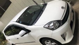Pearl White Toyota Wigo 2015 for sale in San Mateo