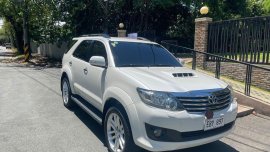 Selling Pearl White Toyota Fortuner 2014 in Makati