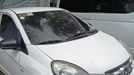 White Honda Brio Amaze 2016
