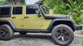 Selling Green Jeep Wrangler 2014 in Antipolo
