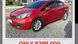 Red Kia Rio 2013 for sale in Mandaue
