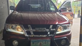 Selling Red Isuzu Sportivo X 2013 in Dasmariñas