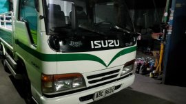 White Isuzu Elf 2015 for sale in Quezon