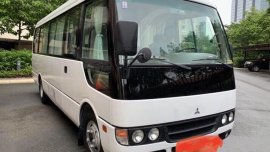 Selling White Mitsubishi Rosa 2012 in Makati