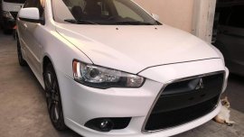Selling Pearl White Mitsubishi Lancer 2010 in Muntinlupa