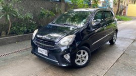 Selling Black Toyota Wigo 2015 in Quezon